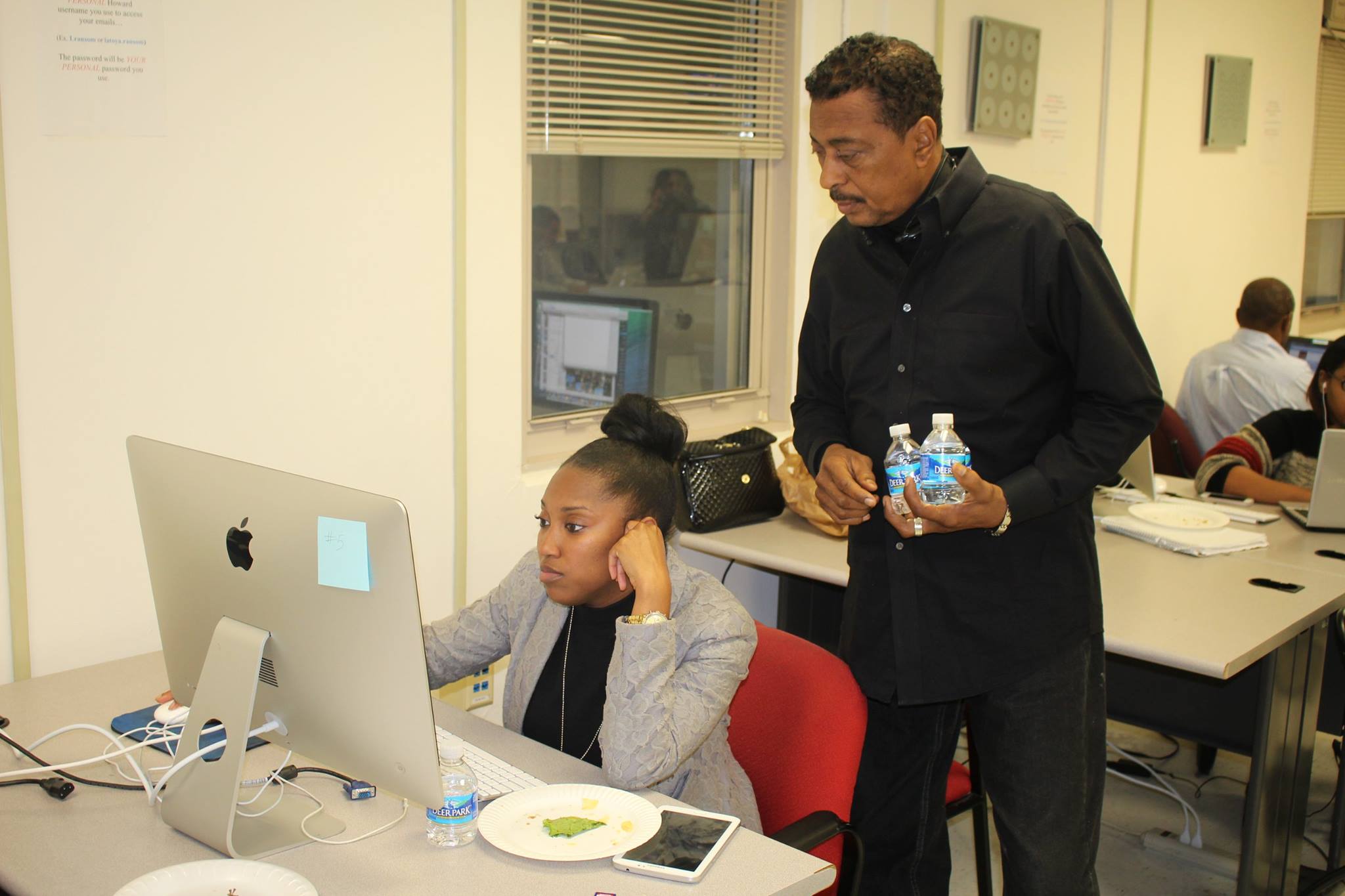 Ron Harris advising student during 2014 Election