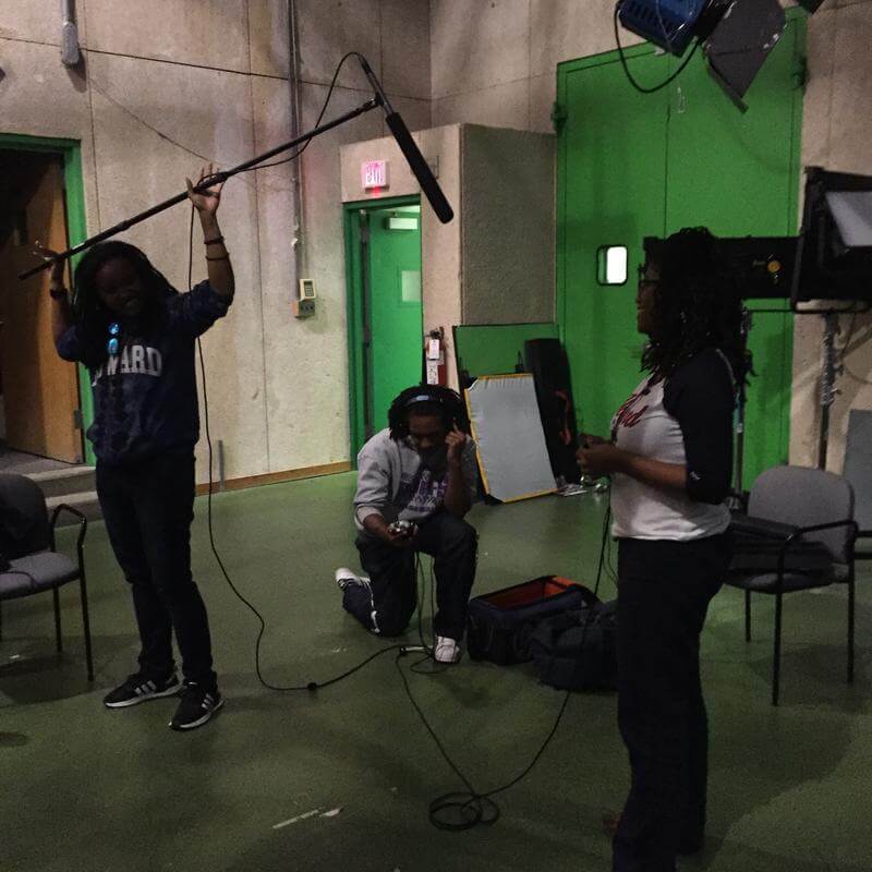 Audio students with green screen and equipment