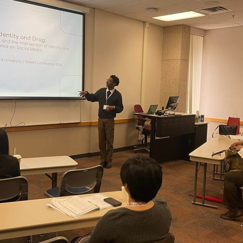 Annenberg Honors Student gives a presentation of his work