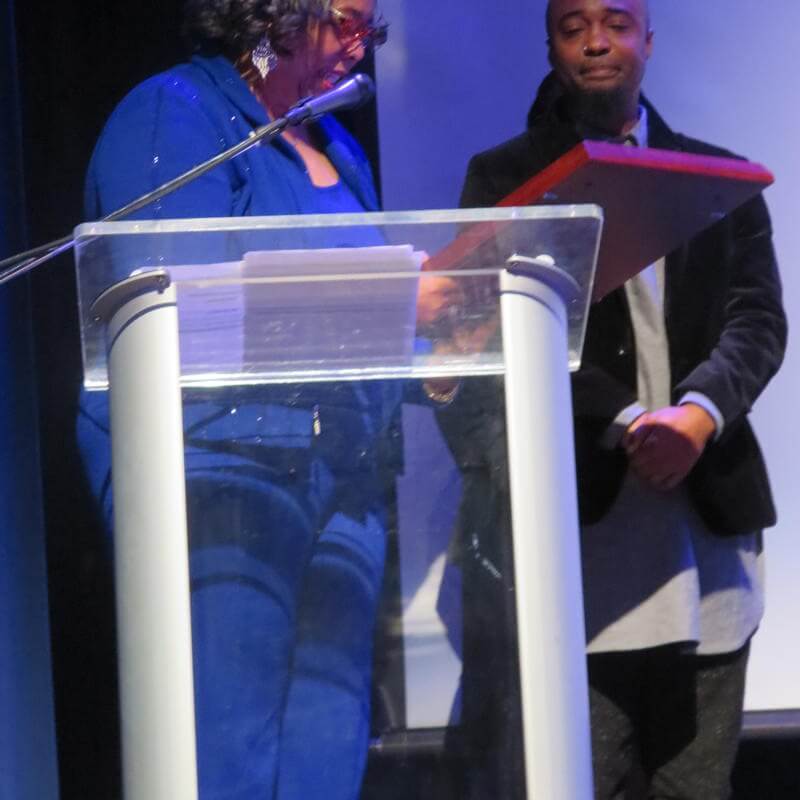 HU Faculty member and Bradford Young on stage at Paul Robeson Student Awards 