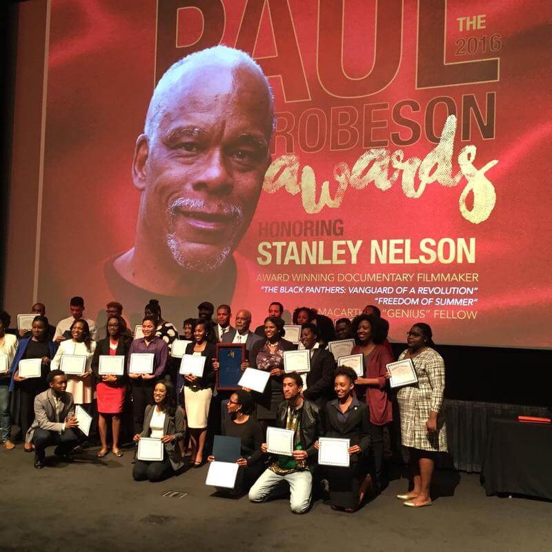 HU MJF Students on stage at 2017 Paul Robeson Student awards honoring Stanley Nelson