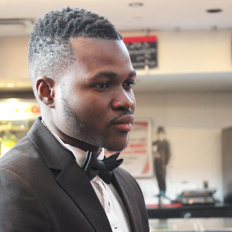 HU Student dressed in tuxedo at Paul Robeson Student Awards
