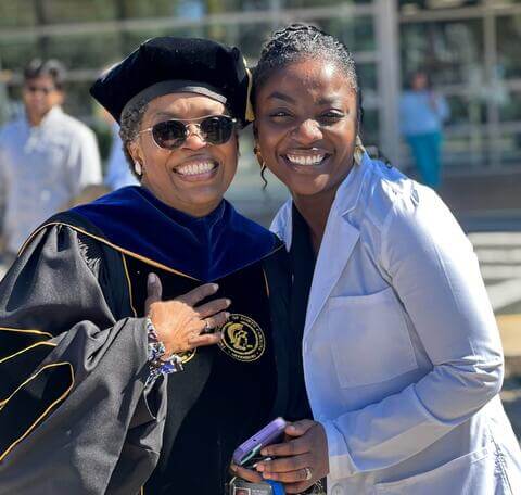 Dr. Robin Eury with Graduate Clinician at White Coat Ceremony in 2024
